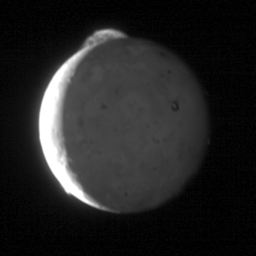 Five-image sequence of New Horizons images showing Io's volcano Tvashtar spewing material 330 km above its surface. Image via NASA PhotoJournal.