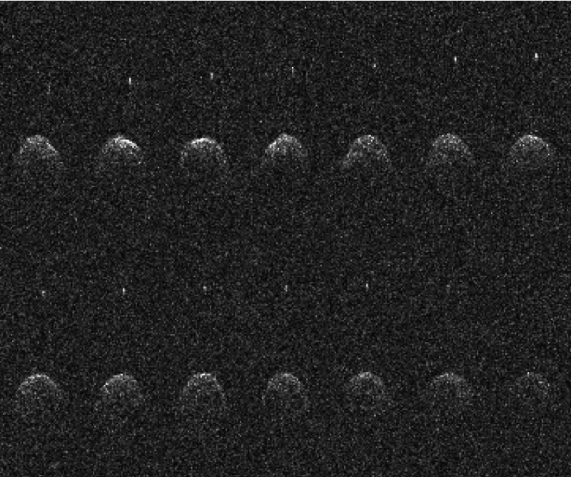 Two rows of fourteen grainy spheres and a tiny companion that the DART mission will target.