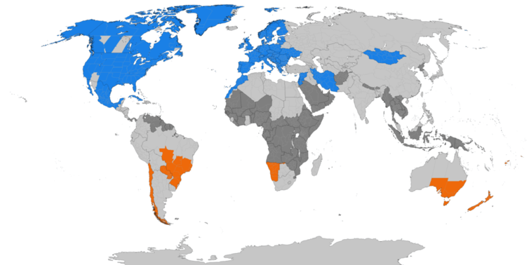 Countries observing daylight saving time (blue in Northern Hemisphere, orange in Southern Hemisphere). Light gray countries have abandoned DST; dark gray nations have never practiced it. Image via   TimeZonesBoy/Wikipedia