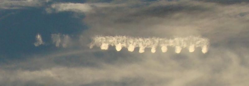 The clue was in the turbulence lobes that can appear hanging from an aircraft contrail. You can see these in this strip of contrail spotted over the Smokey Mountains, US, by Gary Smith. Image via cloudappreciationsociety.org. Used with permission.