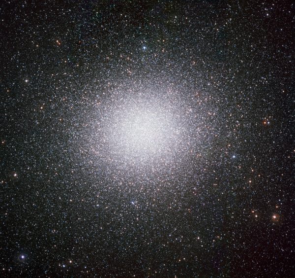 Large round conglomeration of uncountable stars dense in the middle, less so at edges.
