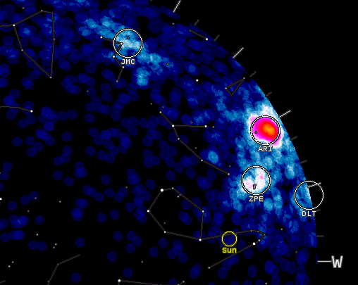 Partial diagram of sky with lighter spots circled in yellow and one circled red spot.