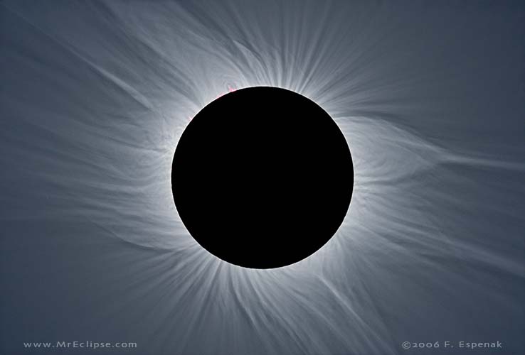 Best sky scenes of 2024: Black circle with white wisps extending out all over in small rays.