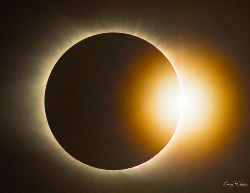 Eclipse season: A totally eclipsed sun with a bright light emerging on one side: the diamond ring effect.