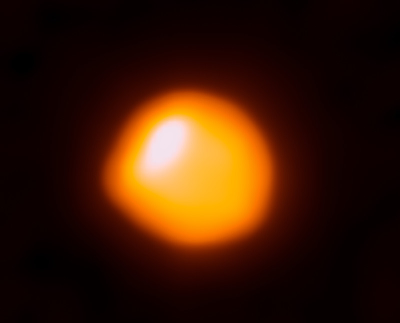 Large, glowing orange sphere with a distinct bulge to one side.
