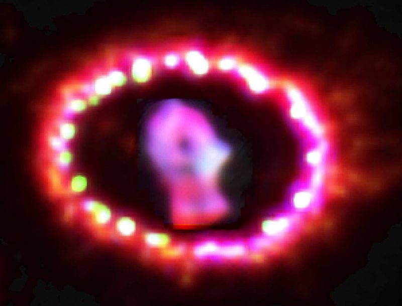 Safe distance from a supernova: Mitten shaped purple glow at center surrounded by hot pink ring.