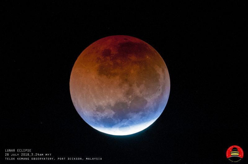 Dark reddish orb with white streak along the bottom.