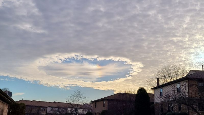 Fallstreak holes or hole-punch clouds: Layer of cloud with hole in the middle and wisps blowing from center.