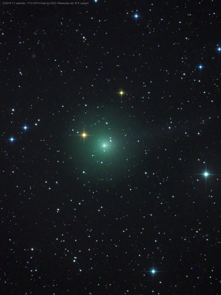 Star field with big fuzzy green spot.