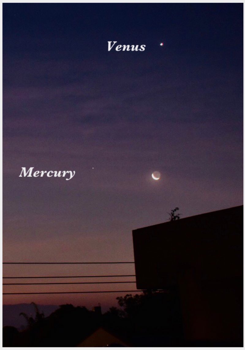 Dawn is just breaking, with Venus above and Mercury and the moon below.