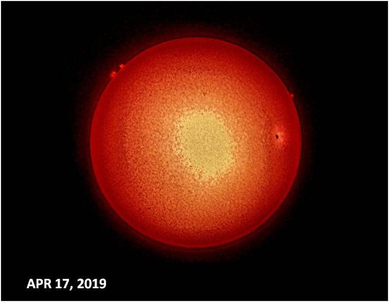 Large image of sun, yellow in middle and red around the edges.