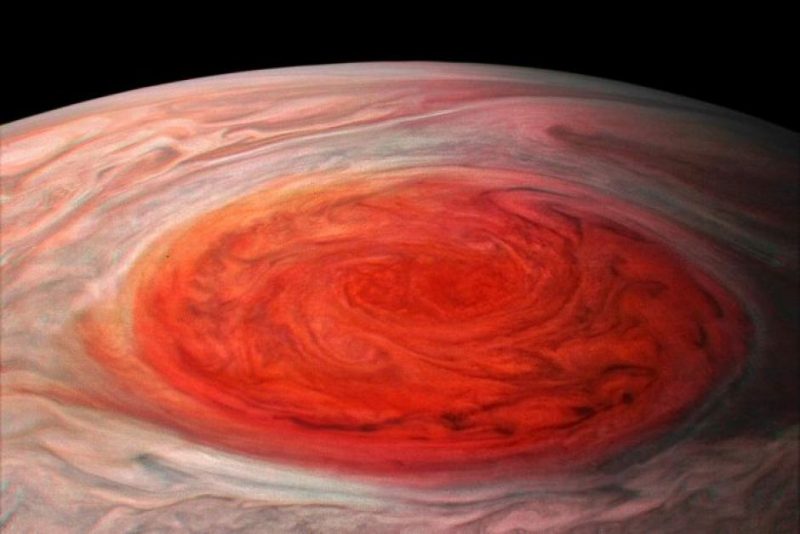 Great Red Spot closeup with many complex swirls inside it.