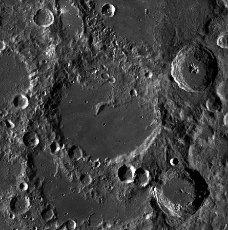 View from above of a round lunar impact crater.
