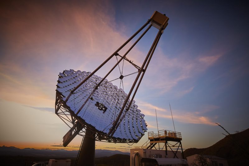 Dish-style telescope made up of many panels, pointing at the sky.