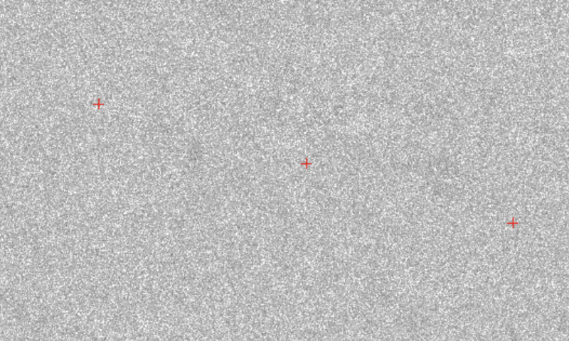 A blank fuzzy images with 3 red crosses.