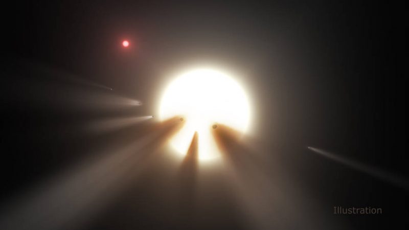 Seven irregularly spaced dark objects with dust and gas tails in front of a sun-like star.