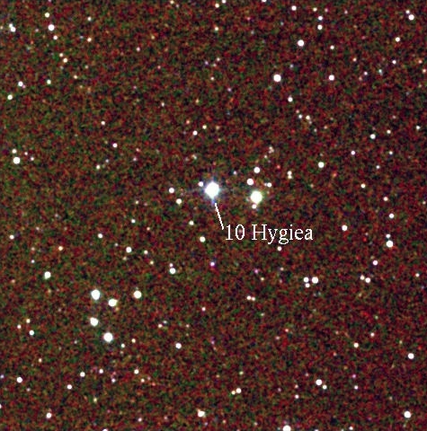 Dense star field with bright dot labeled 10 Hygiea.