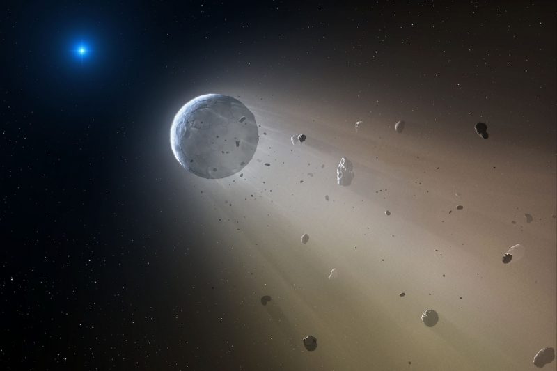 Disintegrating planet with lots of small pieces flying off near bright star.