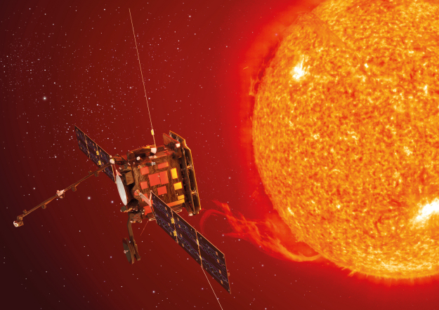 A boxy spacecraft with wide solar arrays on each side near the sun.