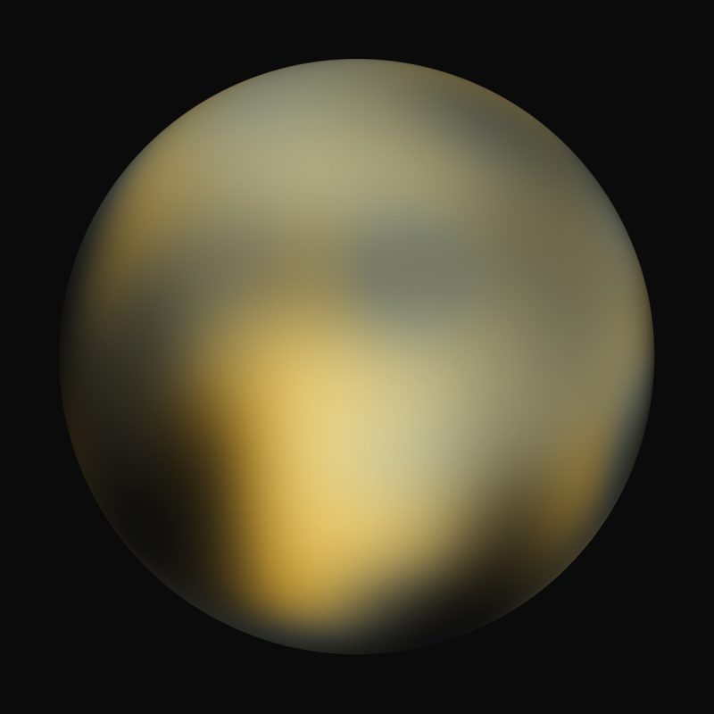 A blurry round planet, with a bright, vaguely heart-shaped feature.