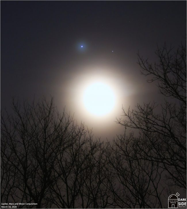 Over-exposed moon with bright Jupiter and fainter Mars above it.