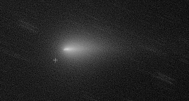 Elongated nuclear of Comet ATLAS with 3 fragments visible.