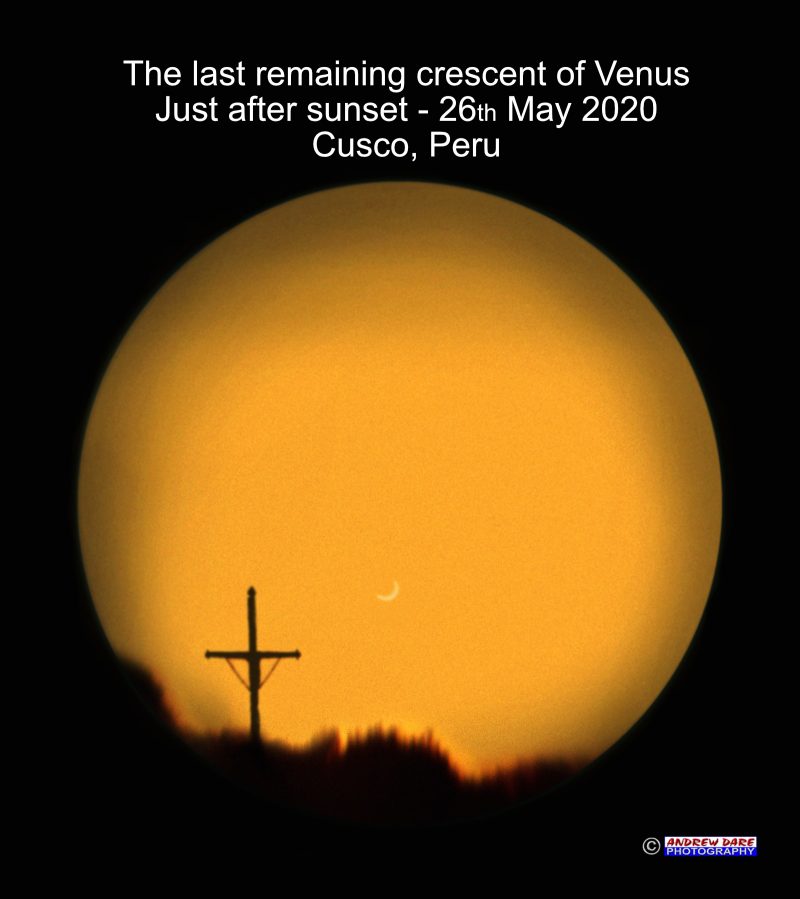 Venus through a telescope, in a mosaic, it looks like, with a cross on a ridgeline.