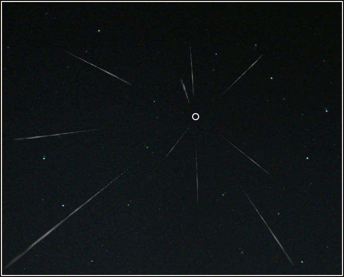 Perseid and Delta Aquariid radiant points, and those of other meteor showers, are shown by streaks radiating from a single point. The point has a white circle around it.