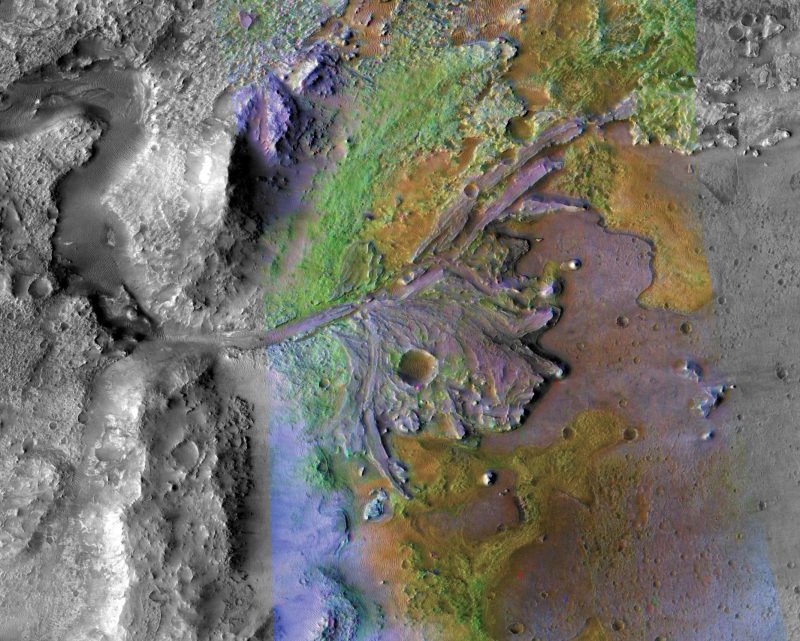 Colorful orbital view of rocky terrain with river channel and duck's foot shaped delta.