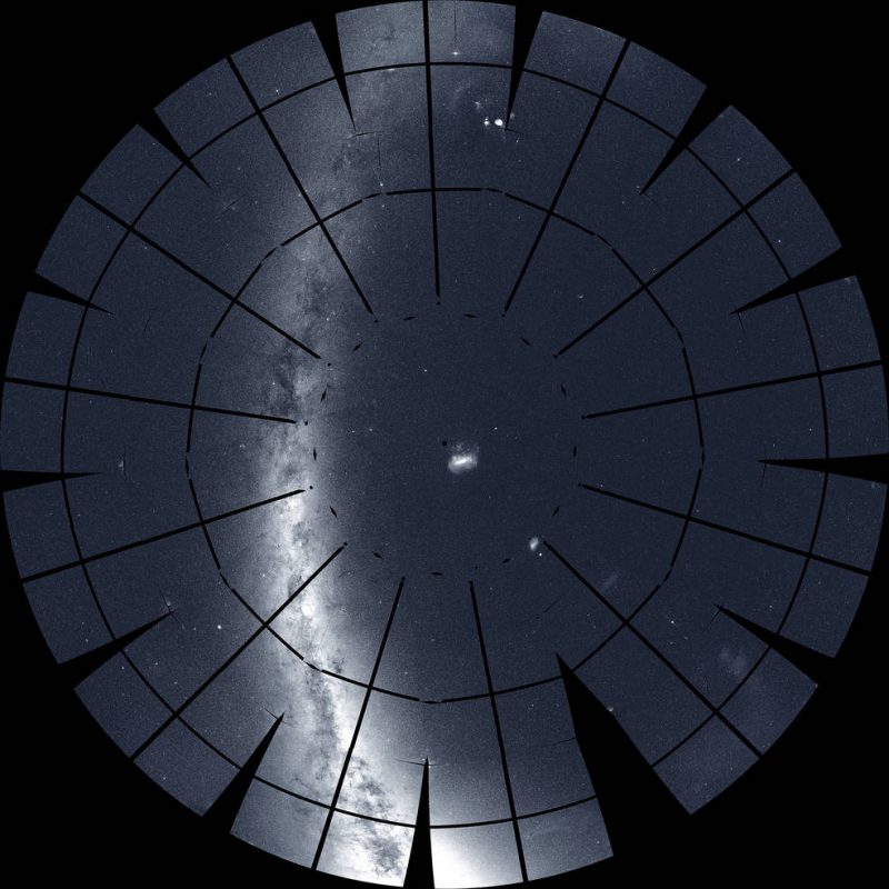 Round radially segmented shape with starry band inside it, on black background.