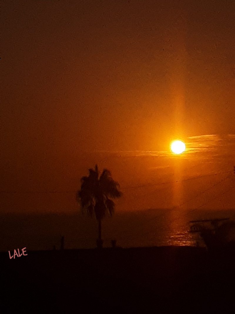 Smokey sunset over the ocean.