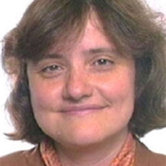 Smiling woman headshot on white background.