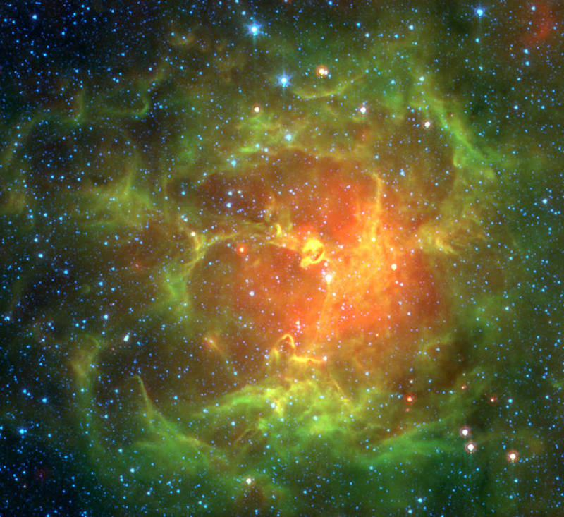 Green and orange clouds in a starry sky.