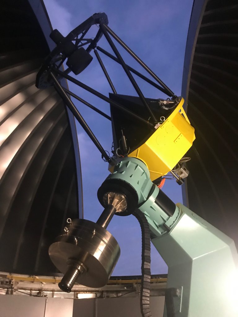 Telescope inside observatory dome.