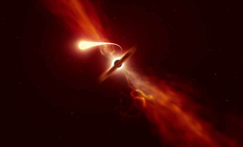 A black hole, with a disk around it and jets emanating from its poles, and with a bright flare escaping it.