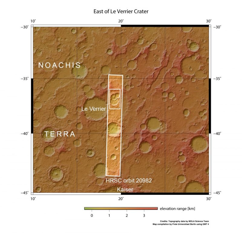 Orbital view of crater-pocked red surface with 2 white rectangles and labeled features.