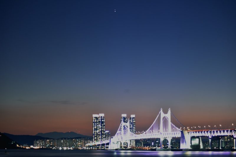 Jupiter and Saturn over South Korea's Diamond Bridge.