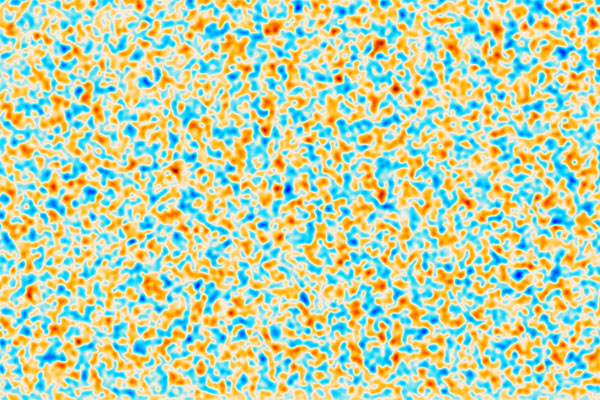 Many tiny orange and blue blobs spread out a square in a semi-repeating pattern.