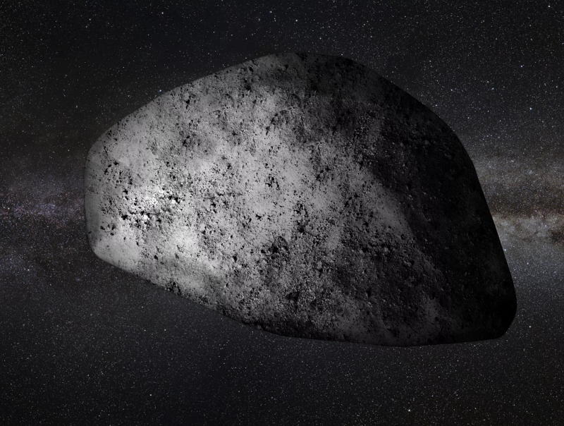 Black and white shaded image of a large irregular body with small pebbles stuck to it.