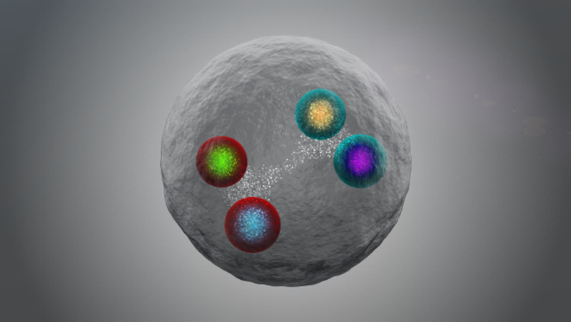 4 small balls, with different colored middles and outsides, with band of dots connecting them, inside a gray ball.
