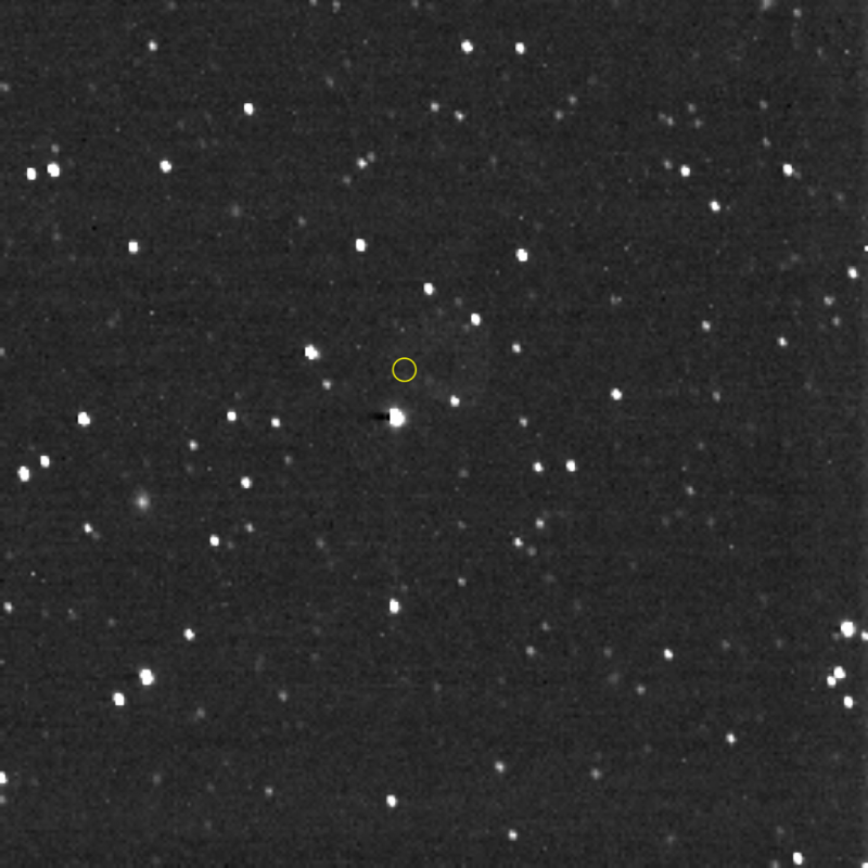 Star field with dark area circled.