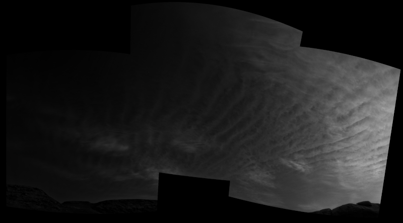 Darker scene with rippled clouds moving out of frame.
