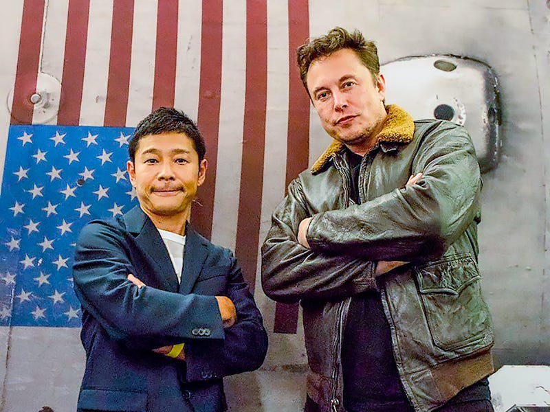 Maezawa and Musk stand side-by-side with folded arms, looking too cool to handle.