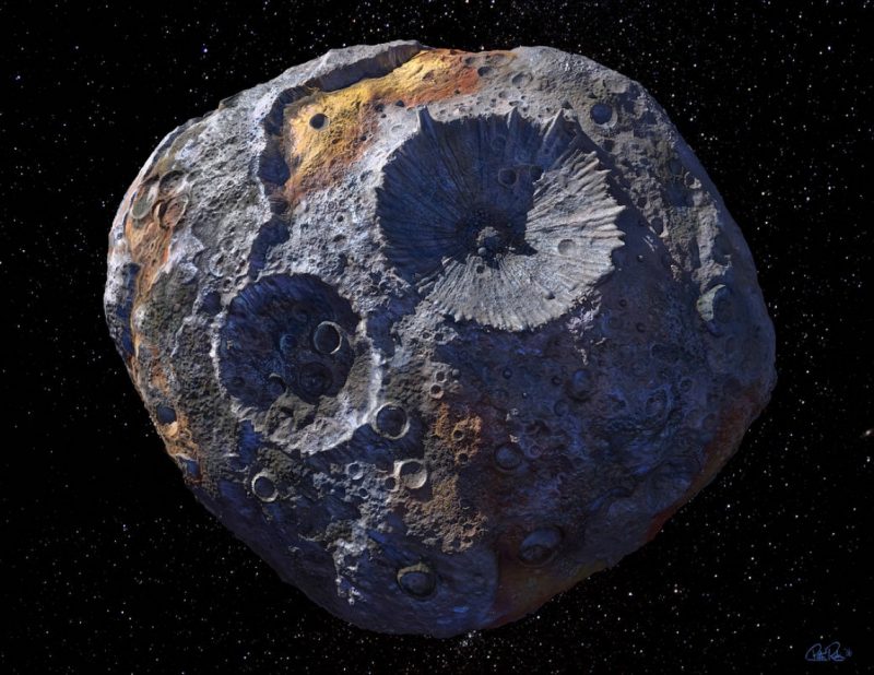 Asteroid Psyche is shown as a rocky body with 2 large craters.