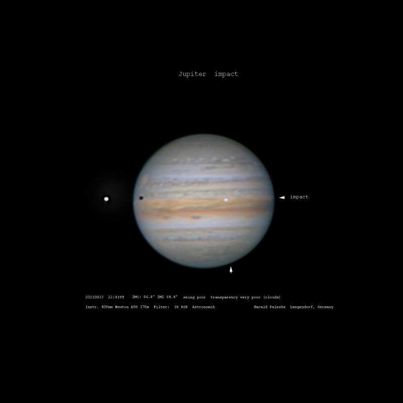 Jupiter with moon and shadow on one side and flash of light on the other.