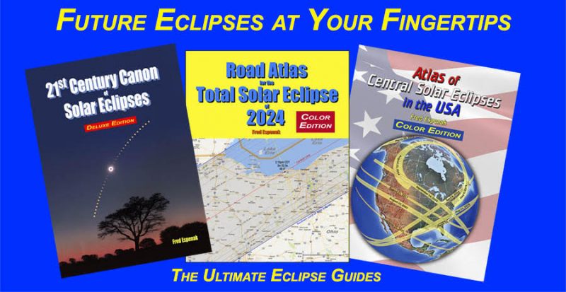 Total lunar eclipse: Brightly colored covers of three large-format books.
