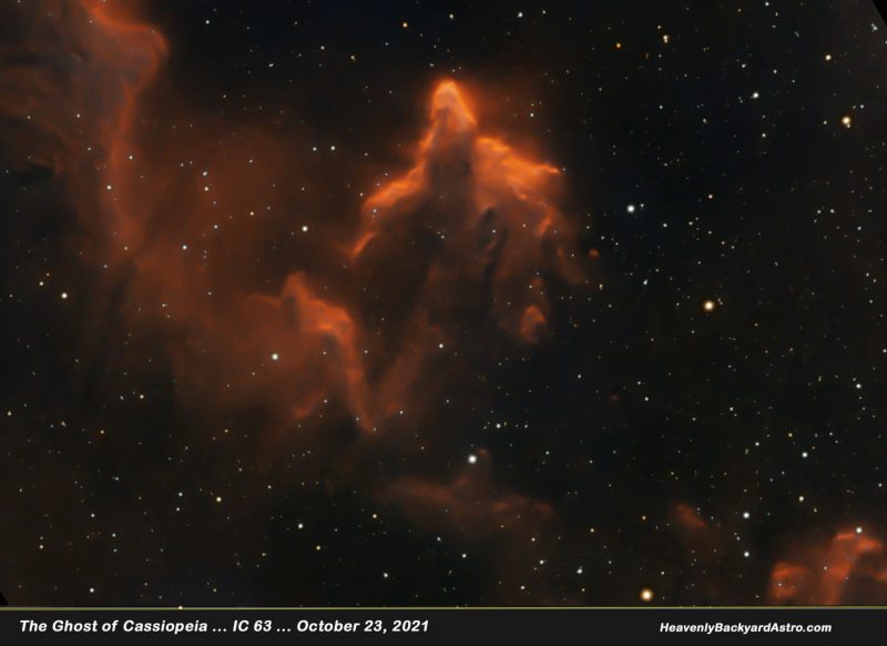 Orangish floating blob against starry background.