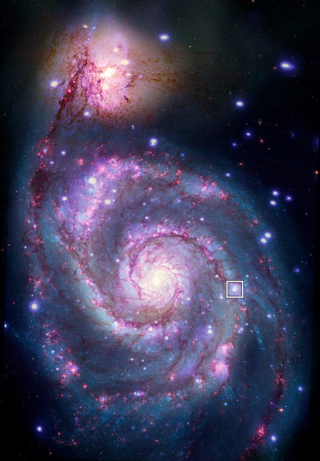 1st extragalactic planet: Purple and blue spiral with bright pink knots on arms and box around small white spot, location of a possible planet.