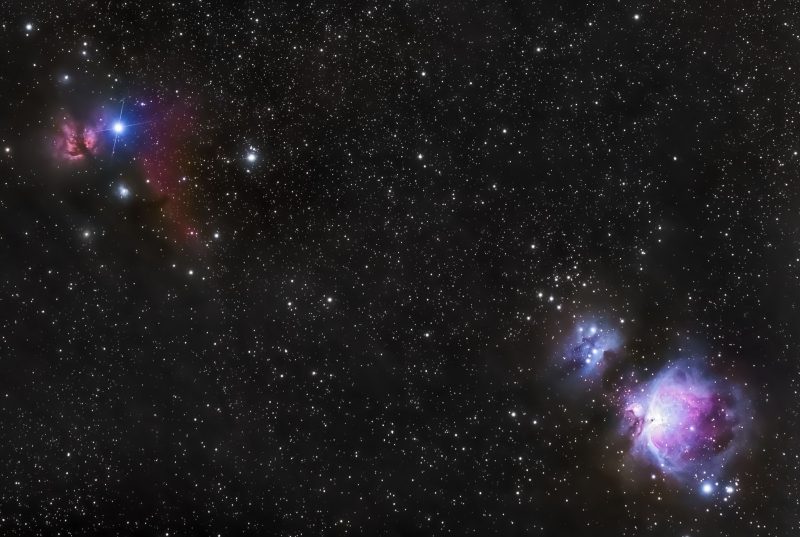 Red cloud and blue star at top left, white and blue clouds with black dust bottom right.