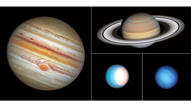 Hubble's Grand Tour: Four giant planets, two banded, one with rings, other two fuzzy blue spheres.